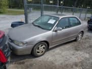 ✅ 2000 Toyota Corolla VE • VIN: 2T1BR12E2YC319804 • Lot: 41895787. Listed on IAAI with 160,985 mi. Free auction sales archive from the USA and detailed vehicle history report at DreamBid. Image 2.