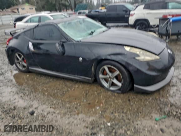 ✅ 2014 Nissan 370Z Touring • VIN: JN1AZ4EH7EM633520 • Lot: 95505045. Listed on Copart with Not provided. Free auction sales archive from the USA and detailed vehicle history report at DreamBid. Image 4.
