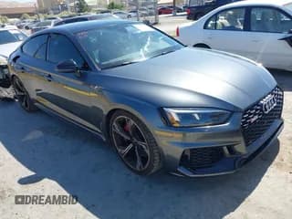 ✅ 2019 Audi RS 5 Sportback • VIN: WUABWCF56KA905421 • Lot: 42495527. Listed on IAAI with 61,778 mi. Free auction sales archive from the USA and detailed vehicle history report at DreamBid. Image 1.