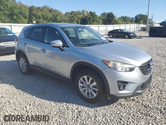 ✅ 2016 Mazda CX-5 Touring • VIN: JM3KE2CY6G0767957 • Lot: 84440465. Listed on Copart with 157,177 mi. Free auction sales archive from the USA and detailed vehicle history report at DreamBid. Image 4.