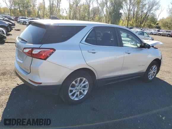 ✅ 2021 Chevrolet Equinox LT • VIN: 3GNAXUEV1MS124909 • Lot: 85860995. Listed on Copart with 88,479 mi. Free auction sales archive from the USA and detailed vehicle history report at DreamBid. Image 3.