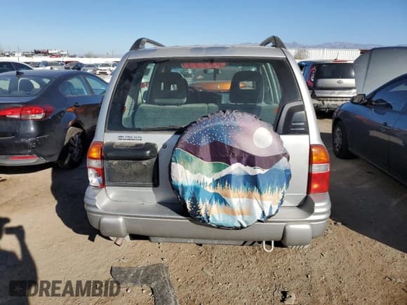 ✅ 2003 Suzuki Vitara • VIN: 2S3TE52V936103483 • Lot: 82235884. Listed on Copart with 173,354 mi. Free auction sales archive from the USA and detailed vehicle history report at DreamBid. Image 6.