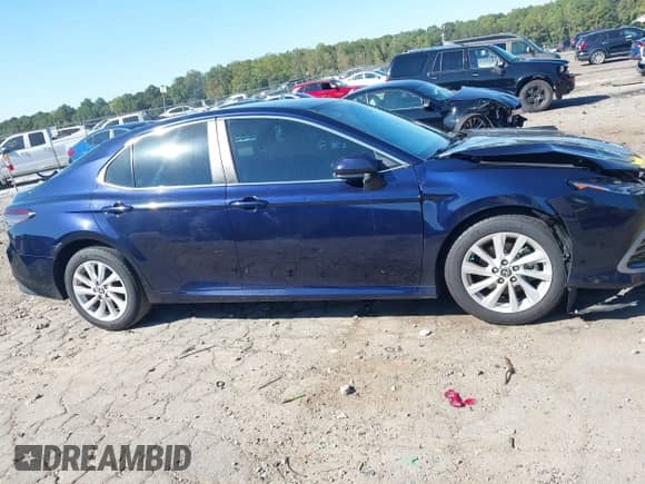 2021 Toyota Camry LE with VIN 4T1C11AK8MU461036, listed as a IAAI auction lot 43351796 with 83,856 mi miles and . Bid and sale history available at DreamBid. Image 13.