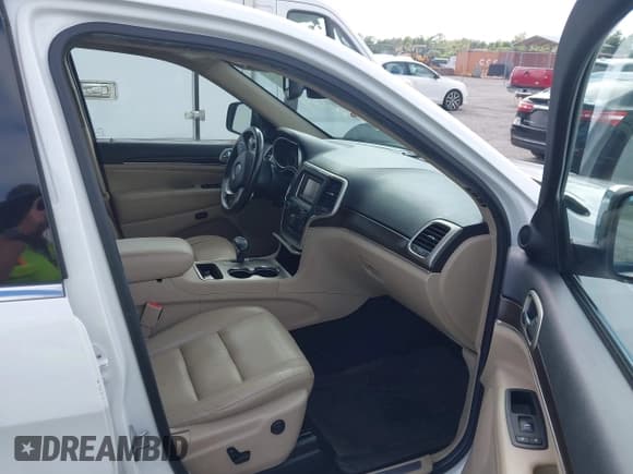 ✅ 2014 Jeep Grand Cherokee Limited • VIN: 1C4RJEBG9EC555658 • Lot: 43554748. Listed on IAAI with 167,750 mi. Free auction sales archive from the USA and detailed vehicle history report at DreamBid. Image 5.