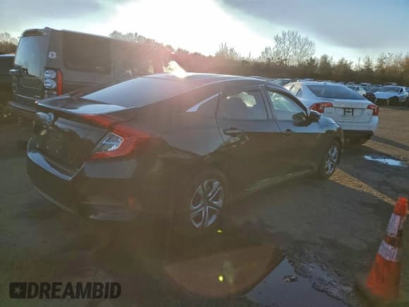 ✅ 2016 Honda Civic LX • VIN: 19XFC2F56GE213911 • Lot: 93831415. Listed on Copart with 79,869 mi. Free auction sales archive from the USA and detailed vehicle history report at DreamBid. Image 3.