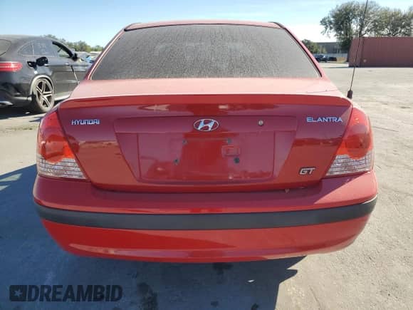 2004 Hyundai Elantra GLS z VIN KMHDN46D24U752362, wystawiony jako Copart lot #81528944 z przebiegiem 157 830 mil mil oraz Szkoda całkowita • Salvage title. Historia ofert i sprzedaży dostępna na DreamBid. Obrazek 6.