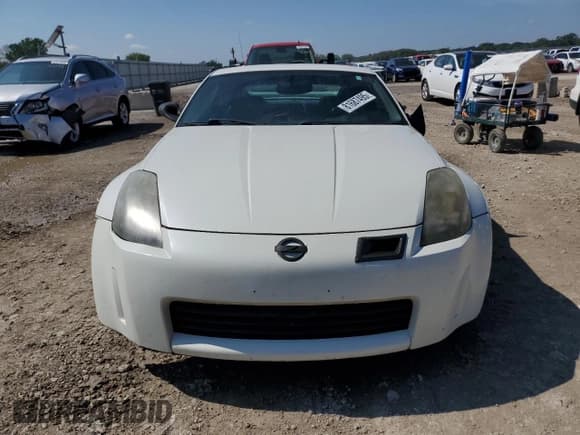 ✅ 2005 Nissan 350Z • VIN: JN1AZ34D05M604000 • Лот: 81687495. Опубликован ранее на Copart с пробегом 182 165 миль. Бесплатный доступ к архиву аукционных продаж из США и подробный отчёт об истории автомобиля на DreamBid. Изображение 5.