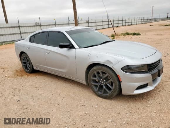 ✅ 2023 Dodge Charger SXT • VIN: 2C3CDXBG4PH623135 • Lot: 58100155. Listed on Copart with 8,964 mi. Free auction sales archive from the USA and detailed vehicle history report at DreamBid. Image 4.