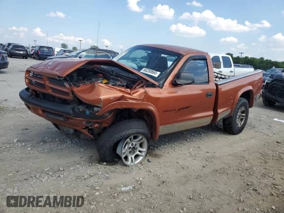 2001 Dodge Dakota Sport z VIN 1B7GG26N31S197440, wystawiony jako Copart lot #68280665 z przebiegiem Nie podano mil oraz Szkoda całkowita • Salvage title. Historia ofert i sprzedaży dostępna na DreamBid. Obrazek 1.