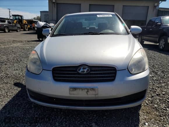 2009 Hyundai Accent Auto GLS z VIN KMHCN46C39U315786, wystawiony jako Copart lot #67562734 z przebiegiem 143 444 mil mil oraz Szkoda całkowita • Salvage title. Historia ofert i sprzedaży dostępna na DreamBid. Obrazek 5.