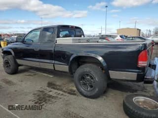 ✅ 1999 Dodge Dakota SLT • VIN: 1B7GG22Y5XS107729 • Lot: 79440034. Wystawiony na Copart z przebiegiem 163 718 mil. Bezpłatny archiwum sprzedaży aukcyjnych z USA i szczegółowy raport historii pojazdu na DreamBid. Zdjęcie 2.