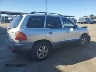 2001 Hyundai Santa Fe GLS z VIN KM8SC83D51U097893, wystawiony jako Copart lot #42773215 z przebiegiem 113 181 mil mil oraz Szkoda całkowita • Salvage title. Historia ofert i sprzedaży dostępna na DreamBid. Obrazek 3.