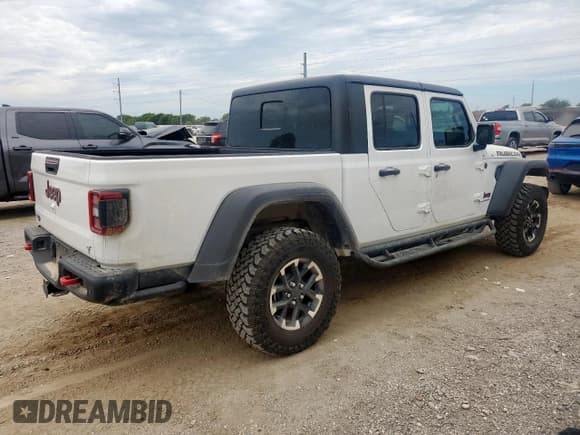 ✅ 2024 Jeep Gladiator Rubicon • VIN: 1C6JJTBG9RL113901 • Лот: 66319585. Опубликован ранее на Copart с пробегом 3 873 миль. Бесплатный доступ к архиву аукционных продаж из США и подробный отчёт об истории автомобиля на DreamBid. Изображение 3.