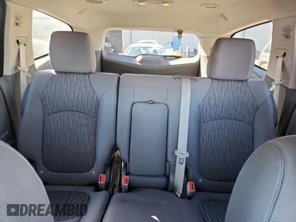 ✅ 2017 Chevrolet Traverse LS • VIN: 1GNKVFED5HJ144133 • Lot: 86885355. Wystawiony na Copart z przebiegiem 91 453 mil. Bezpłatny archiwum sprzedaży aukcyjnych z USA i szczegółowy raport historii pojazdu na DreamBid. Zdjęcie 10.