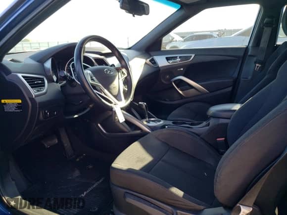 2017 Hyundai Veloster z VIN KMHTC6AD6HU320948, wystawiony jako Copart lot #45232853 z przebiegiem 34 130 mil mil oraz . Historia ofert i sprzedaży dostępna na DreamBid. Obrazek 7.