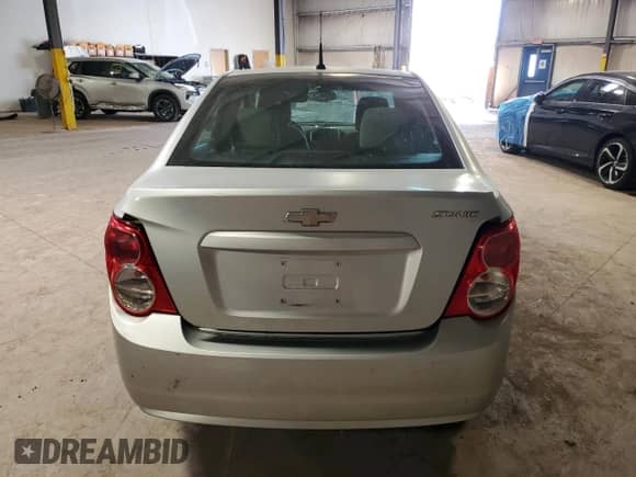 2012 Chevrolet Sonic LS with VIN 1G1JA5SHXC4152634, listed as a Copart auction lot 70631965 with 143,934 mi miles and Salvage title. Bid and sale history available at DreamBid. Image 6.
