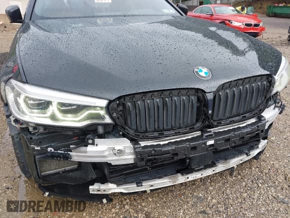 ✅ 2018 BMW 5 Series M550i xDrive • VIN: WBAJB9C5XJB286923 • Лот: 42527301. Опубликован ранее на IAAI с пробегом 76 923 миль. Бесплатный доступ к архиву аукционных продаж из США и подробный отчёт об истории автомобиля на DreamBid. Изображение 18.