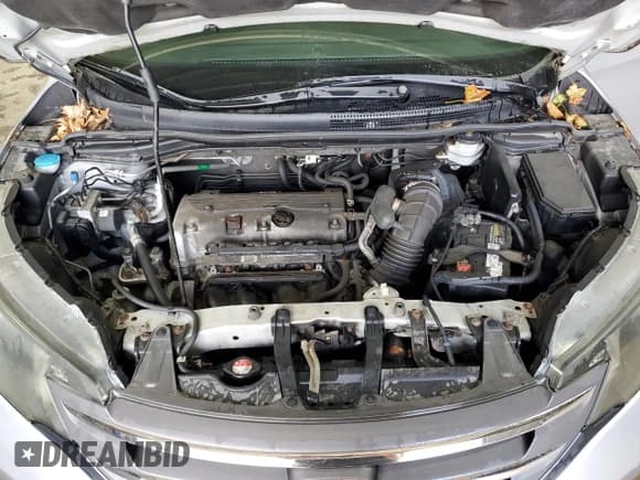 ✅ 2012 Honda CR-V LX • VIN: 2HKRM4H37CH619896 • Lot: 80855245. Listed on Copart with 121,331 mi. Free auction sales archive from the USA and detailed vehicle history report at DreamBid. Image 12.