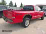 2003 Dodge Dakota Sport z VIN 1D7HG32NX3S296233, wystawiony jako IAAI lot #42394001 z przebiegiem 224 887 mil mil oraz . Historia ofert i sprzedaży dostępna na DreamBid. Obrazek 4.