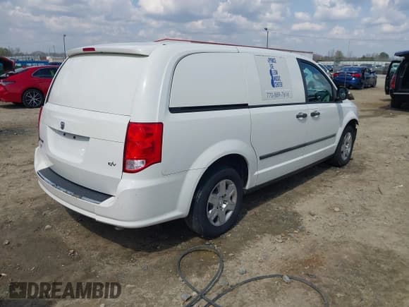 ✅ 2012 Ram Cargo Van • VIN: 2C4JDGAG0CR272362 • Lot: 41781776. Listed on IAAI with 128,114 mi. Free auction sales archive from the USA and detailed vehicle history report at DreamBid. Image 4.
