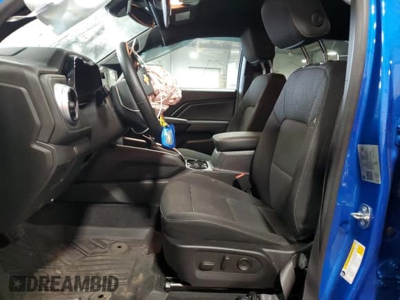 ✅ 2023 Chevrolet Colorado 4WD LT • VIN: 1GCPTCEK4P1222014 • Lot: 80140305. Listed on Copart with 9,990 mi. Free auction sales archive from the USA and detailed vehicle history report at DreamBid. Image 7.