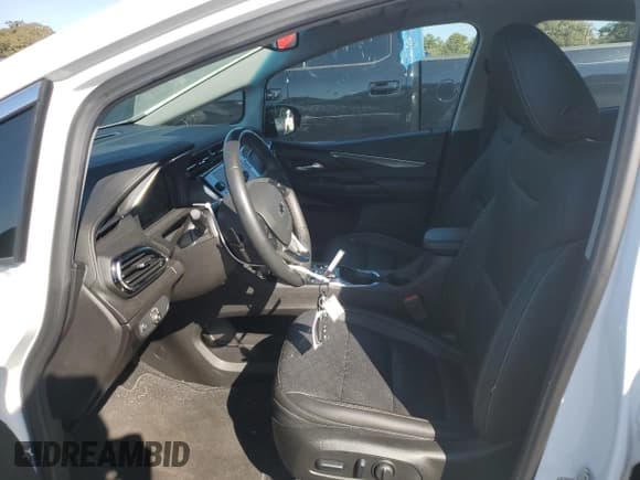 ✅ 2023 Chevrolet Bolt EV 2LT • VIN: 1G1FX6S06P4205033 • Lot: 77526514. Wystawiony na Copart z przebiegiem 6 592 mil. Bezpłatny archiwum sprzedaży aukcyjnych z USA i szczegółowy raport historii pojazdu na DreamBid. Zdjęcie 7.