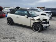 ✅ 2009 MINI Convertible • VIN: WMWMR335X9TU95543 • Лот: 81501015. Опубликован ранее на Copart с пробегом 92 132 миль. Бесплатный доступ к архиву аукционных продаж из США и подробный отчёт об истории автомобиля на DreamBid. Изображение 4.