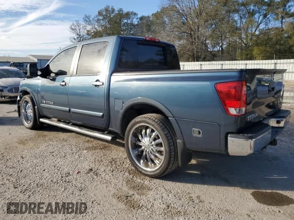 ✅ 2013 Nissan Titan SL • VIN: 1N6BA0ED8DN314700 • Lot: 88534545. Listed on Copart with 199,439 mi. Free auction sales archive from the USA and detailed vehicle history report at DreamBid. Image 2.