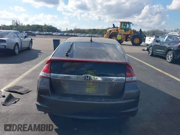 ✅ 2013 Honda Insight LX • VIN: JHMZE2H58DS001247 • Lot: 43801615. Listed on IAAI with 113,454 mi. Free auction sales archive from the USA and detailed vehicle history report at DreamBid. Image 16.