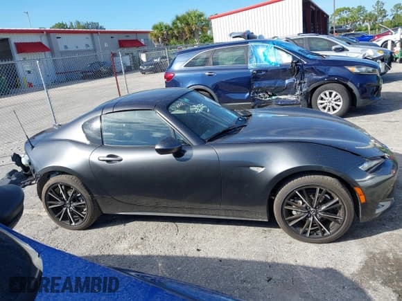 ✅ 2024 Mazda MX-5 Miata Grand Touring • VIN: JM1NDAM78R0608840 • Lot: 43646398. Wystawiony na IAAI z przebiegiem 5 973 mil. Bezpłatny archiwum sprzedaży aukcyjnych z USA i szczegółowy raport historii pojazdu na DreamBid. Zdjęcie 14.