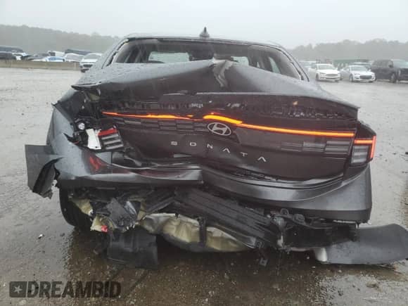 2025 Hyundai Sonata SEL with VIN KMHL64JA6SA502773, listed as a Copart auction lot 90327405 with 6,770 mi miles and Salvage title. Bid and sale history available at DreamBid. Image 6.