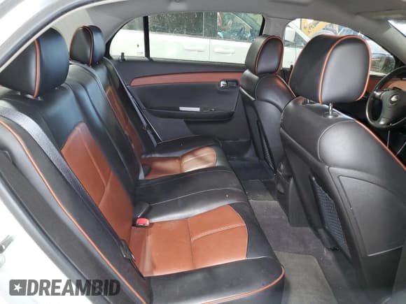 ✅ 2009 Chevrolet Malibu LTZ • VIN: 1G1ZK57B69F122015 • Lot: 78443854. Listed on Copart with 135,867 mi. Free auction sales archive from the USA and detailed vehicle history report at DreamBid. Image 10.