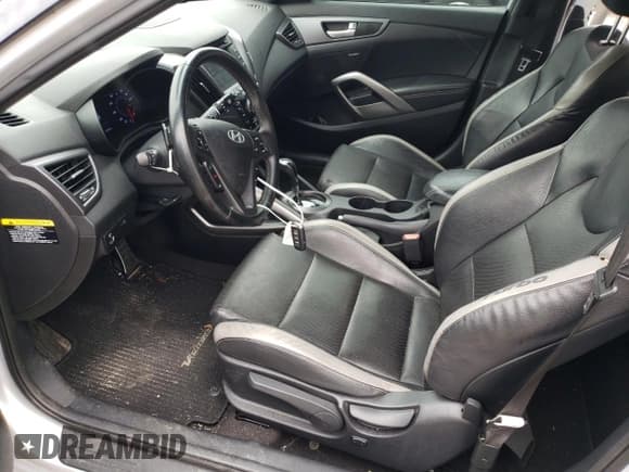 ✅ 2016 Hyundai Veloster Turbo • VIN: KMHTC6AE4GU288489 • Lot: 69663034. Wystawiony na Copart z przebiegiem 71 419 mil. Bezpłatny archiwum sprzedaży aukcyjnych z USA i szczegółowy raport historii pojazdu na DreamBid. Zdjęcie 7.