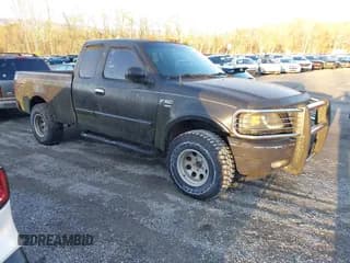 ✅ 1999 Ford F-150 • VIN: 1FTRX18W5XNA56112 • Lot: 43812267. Wystawiony na IAAI z przebiegiem Nie podano. Bezpłatny archiwum sprzedaży aukcyjnych z USA i szczegółowy raport historii pojazdu na DreamBid. Zdjęcie 1.