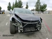 ✅ 2024 Tesla Model Y Long Range • VIN: 7SAYGDEE4RA216054 • Lot: 84733775. Listed on Copart with 19,195 mi. Free auction sales archive from the USA and detailed vehicle history report at DreamBid. Image 14.