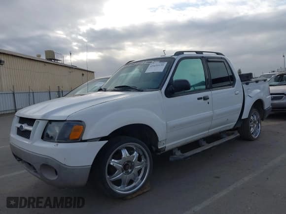 ✅ 2001 Ford Explorer Sport Trac • VIN: 1FMZU67E21UB69328 • Lot: 43433155. Listed on IAAI with 220,626 mi. Free auction sales archive from the USA and detailed vehicle history report at DreamBid. Image 2.