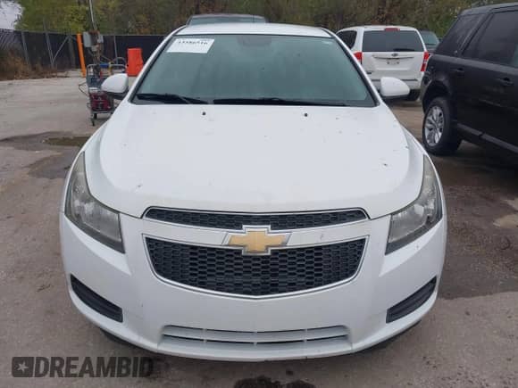 2014 Chevrolet Cruze 1LT with VIN 1G1PC5SB5E7312954, listed as a IAAI auction lot 43586516 with 151,548 mi miles and . Bid and sale history available at DreamBid. Image 6.