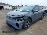 ✅ 2023 Volkswagen ID.4 Pro • VIN: 1V2VMPE85PC036338 • Лот: 42529725. Опубликован ранее на IAAI с пробегом 23 393 миль. Бесплатный доступ к архиву аукционных продаж из США и подробный отчёт об истории автомобиля на DreamBid. Изображение 2.