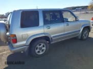 ✅ 1999 Isuzu Trooper S • VIN: JACDJ58X0X7927321 • Lot: 43713393. Listed on IAAI with 293,015 mi. Free auction sales archive from the USA and detailed vehicle history report at DreamBid. Image 4.