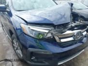 ✅ 2019 Honda Pilot EX-L • VIN: 5FNYF5H51KB038629 • Lot: 43342079. Listed on IAAI with 53,948 mi. Free auction sales archive from the USA and detailed vehicle history report at DreamBid. Image 18.
