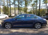 ✅ 2014 Volkswagen Passat SEL Premium • VIN: 1VWCN7A30EC099874 • Лот: 43490284. Опубликован ранее на IAAI с пробегом 125 395 миль. Бесплатный доступ к архиву аукционных продаж из США и подробный отчёт об истории автомобиля на DreamBid. Изображение 14.