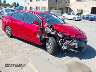 ✅ 2021 Toyota Prius LE • VIN: JTDKAMFP2M3170995 • Lot: 42620585. Wystawiony na IAAI z przebiegiem 112 034 mil. Bezpłatny archiwum sprzedaży aukcyjnych z USA i szczegółowy raport historii pojazdu na DreamBid. Zdjęcie 1.