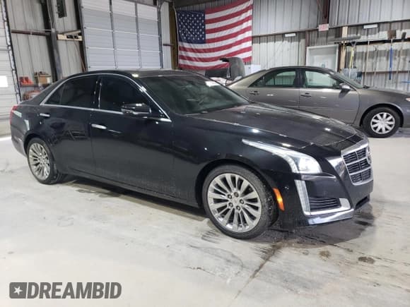 ✅ 2014 Cadillac CTS Premium AWD • VIN: 1G6AZ5S36E0184319 • Lot: 57847875. Listed on Copart with 86,669 mi. Free auction sales archive from the USA and detailed vehicle history report at DreamBid. Image 4.