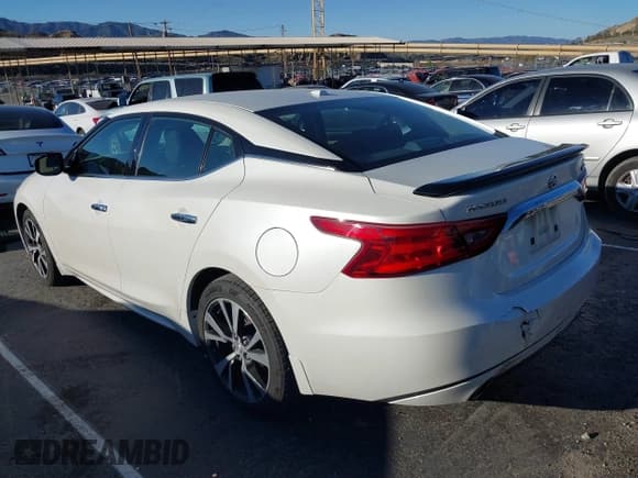✅ 2016 Nissan Maxima Platinum • VIN: 1N4AA6AP2GC409454 • Lot: 41667739. Listed on IAAI with 91,132 mi. Free auction sales archive from the USA and detailed vehicle history report at DreamBid. Image 3.