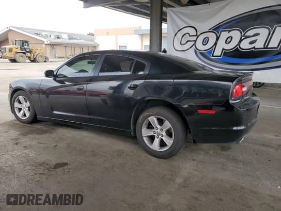 2014 Dodge Charger SE z VIN 2C3CDXBG4EH272014, wystawiony jako Copart lot #85945115 z przebiegiem 130 951 mil mil oraz Szkoda całkowita • Salvage title. Historia ofert i sprzedaży dostępna na DreamBid. Obrazek 2.