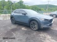 ✅ 2022 Mazda CX-30 S Carbon Edition • VIN: 3MVDMBCL8NM430370 • Lot: 42340348. Listed on IAAI with 79,513 mi. Free auction sales archive from the USA and detailed vehicle history report at DreamBid. Image 1.