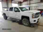 2017 Chevrolet Silverado 2500HD High Country with VIN 1GC1KXEG1HF101246, listed as a Copart auction lot 60098225 with 222,043 mi miles and Salvage title. Bid and sale history available at DreamBid. Image 4.