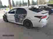 2023 Toyota Camry SE with VIN 4T1G11BK2PU099094, listed as a IAAI auction lot 41403372 with 57,261 mi miles and . Bid and sale history available at DreamBid. Image 3.