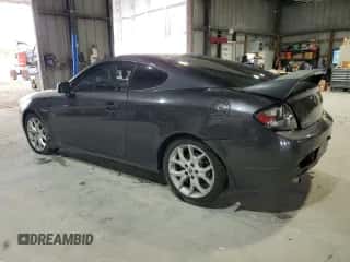 ✅ 2008 Hyundai Tiburon GT • VIN: KMHHN66F18U280756 • Лот: 81469935. Опубликован ранее на Copart с пробегом 227 955 миль. Бесплатный доступ к архиву аукционных продаж из США и подробный отчёт об истории автомобиля на DreamBid. Изображение 2.