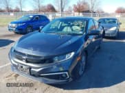 ✅ 2019 Honda Civic EX • VIN: 19XFC1F34KE204349 • Lot: 43780668. Listed on IAAI with 70,089 mi. Free auction sales archive from the USA and detailed vehicle history report at DreamBid. Image 17.